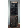 Image 1 : A STAINED OAK STANDING CORNER CABINET, 19th CENTURY, in two parts, the base with a carved door (w...
