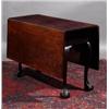 Image 1 : A MAHOGANY DROP LEAF TABLE, MID 18th CENTURY, with rectangular top, on cabriole legs with claw an...