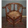 Image 1 : AN ELMWOOD COUNTRY MADE CORNER ARMCHAIR, 18th CENTURY, with flat outscrolled arms and pierced vas...