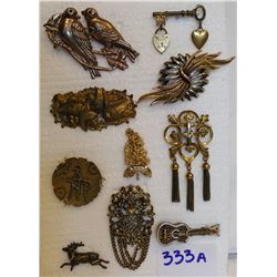 10 BROOCHES