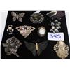 Image 1 : 9 BROOCHES