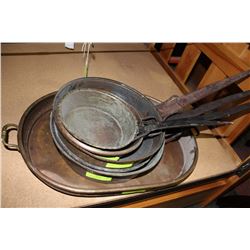 STACK OF VINTAGE COPPER SAUCE PANS