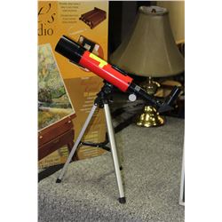 SMALL TELESCOPE ON TRIPOD STAND