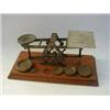 Image 1 : A SET OF MORDAN BRASS POSTAL SCALES, late 19th Century, with five circular flat weights, on a mah...