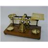 Image 1 : A SET OF BRASS MORDAN LETTER SCALES, early 20th Century, with ten circular flat weights, width 26...