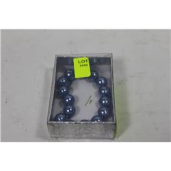 PURPLE SEASHELL PEARL BRACELET