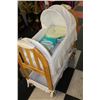 Image 1 : EDDIE BAUER SAND COLOURED ROCKING BASSINET