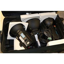 SUITCASE WITH THREE PHOTOGRAPHERS LIGHTS