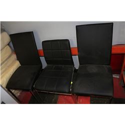 THREE CHROME AND LEATHERETTE SIDE CHAIRS
