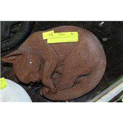 BROWN CONCRETE SLEEPING CAT