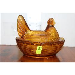 MEDIUM SIZED AMBER GLASS HEN ON NEST
