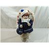 Image 1 : SEATED PORCELAIN DOLL IN WICKER CHAIR