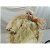 Image 2 : PORCELAIN DOLL IN WICKER CARRIAGE