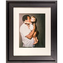 Mohamed Ali with a Child