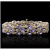 Image 1 : 14KT Yellow Gold 24.17ctw Tanzanite and Diamond Bracelet