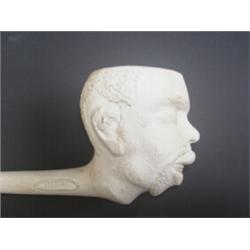 Victorian negro-head clay pipe by T Holland, No. 227, diamond registration mark, 7 1/2 in....