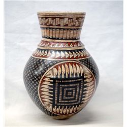 Mata Ortiz Polychrome Eye Dazzler Jar by L. Ortiz