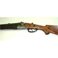 German drilling shotgun. Made in Suhl. Note damage to trigger guard. $1500-2000...