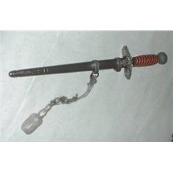 Luttwaffen Nazi Officers dagger with sword knot and red handle. Good condition. $250-450...