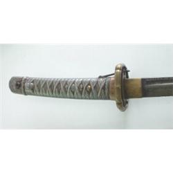 Samurai sword with silver handle. Brass Tsuba. Good condition. $250-450...