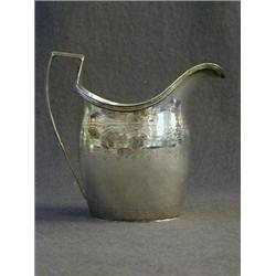A PETER, WILLIAM & ANNE BATEMAN CREAM JUG, helmet shape, reeded handle and rim, bright cut girdle...