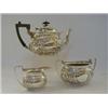Image 1 : A THREE PIECE BOMBE TEA SERVICE, Art Nouveau chased design, maker Dixons, Sheffield 1904, (approx...
