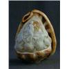 Image 1 : A CAMEO CARVED CONCH SHELL, first half of the 20th Century, classically draped maiden making musi...