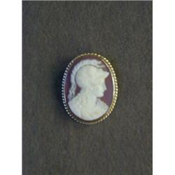 A MALACHITE OVAL CAMEO BROOCH, late 19th Century, head and shoulders portrait of gentleman wearin...