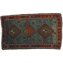 CAUCASIAN THROW RUG - End wear and low spots.  3' x 5'4", F-G.  Est. 150-250...