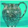 Image 1 : REPOUSSE STERLING PITCHER - S. Kirk & Son, mask under spout, twist handle, repousse throughout wi...
