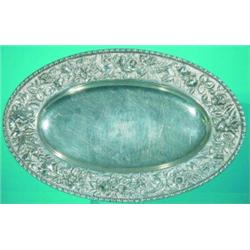 REPOUSSE STERLING PLATER - S. Kirk & Son, wide repousse floral foliate border, #30, approx. 25 T....