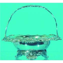 GEORGE IV SMALL HANDLED BASKET - Reticulated handle, shell and foliate border, vermeil bowl, paw...