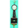 Image 1 : AMERICAN BANJO CLOCK - Weight driven, black and gold eglomise panels; finial probably replaced....