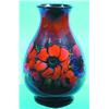 Image 1 : MOORCROFT VASE - Painted ceramic, floral design, retains partial paper label; fine crazing.  H-12...