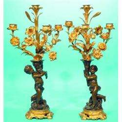 PAIR BRONZE FIGURAL CHERUB CANDELABRA - Patinated and gilt bronze, 4-light.  H-19", VG-EX.  Est....