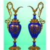 Image 1 : SMALL PAIR OF PORCELAIN EWERS - Painted porcelain, gilt decorated with bronze mounts; both have s...