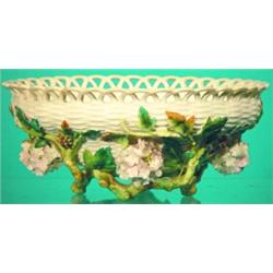 PORCELAIN CENTER BOWL - Basket weave embossed with applied flowers and vines; flower and leaf los...