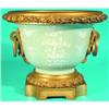 Image 1 : CELADON ORMOLU MOUNTED PLANTER - Painted porcelain with flowers, trees, birds, ring handles.  H-1...