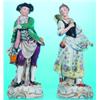 PAIR SITZENDORF FIGURES - Painted porcelain figures of male and female figures with flowers; gent...