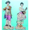 PAIR MEISSEN MUSICIAN FIGURES - Painted porcelain figures of man and woman playing musical instru...