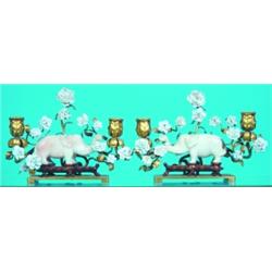 MUTTON JADE ELEPHANT CANDLEHOLDERS - Jade elephants surrounded by white porcelain flowers on gilt...