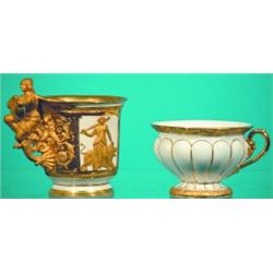 LOT 2 PORCELAIN CUPS - (1) KPM with painted portrait panel, embossed classical panels with figura...