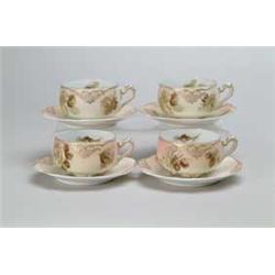FOUR OLD IVORY CUPS AND SAUCERS.