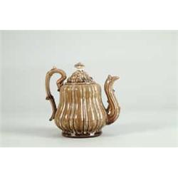 BENNINGTON COVERED TEAPOT IN THE "ALTERNATE RIB" PATTERN.