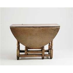 EARLY OAK DROP LEAF GATELEG TABLE.