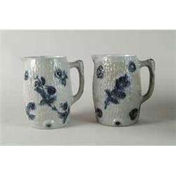 TWO STONEWARE TYPE PITCHERS.