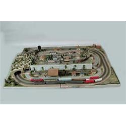 COMPLETE TRAIN SET WITH LARGE VILLAGE BOARD AND TWO SETS OF TRAINS.