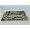 Image 1 : COMPLETE TRAIN SET WITH LARGE VILLAGE BOARD AND TWO SETS OF TRAINS.