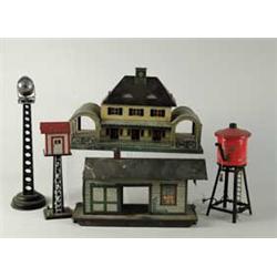 LOT OF FIVE TIN TRAIN BUILDINGS.