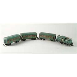 FOUR PIECE LIONEL O GAUGE TRAIN.